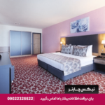 تصویری از اتاق استاندارد در هتل Euphoria Batumi با دکوراسیون مدرن و امکانات رفاهی کامل.​