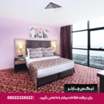 تصویری از اتاق استاندارد در هتل Euphoria Batumi با دکوراسیون مدرن و امکانات رفاهی کامل.​
