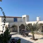 مجتمع ساحلی غروب هنگام قشم